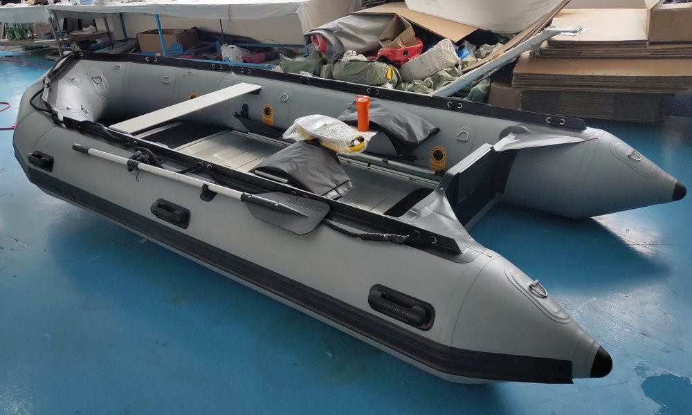 French Orca 866 Hypalon inflatable boat with motor in dark grey color
