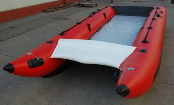 China Red Hand Crafted High Speed Inflatable Boats Racing Catamaran Boat With 450cm Length supplier